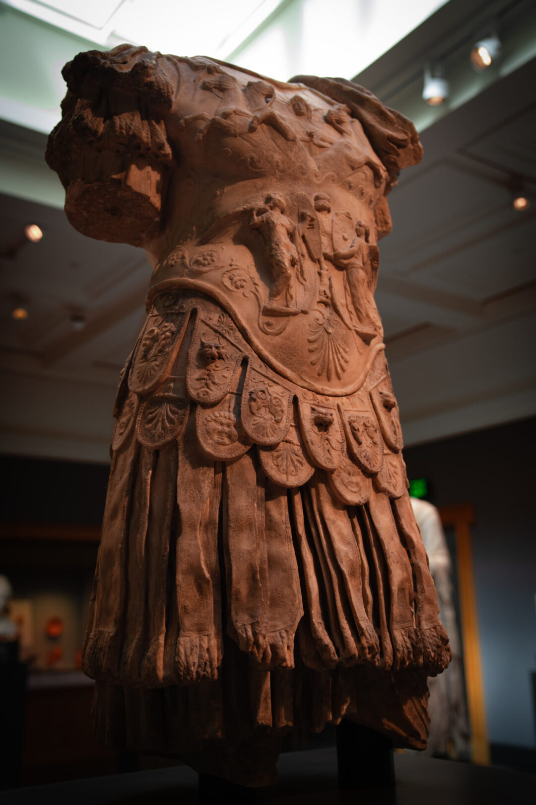 A Roman sculpture from 83-85 of the Torso of a Man Wearing Armor at the Getty Villa in Los Angeles, California