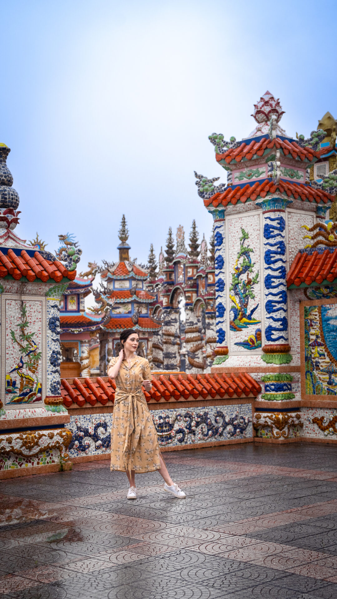 Travel Blogger Jordan Gassner looking into the distance inside An Bang Cemetery City of Ghosts in Hue, Vietnam