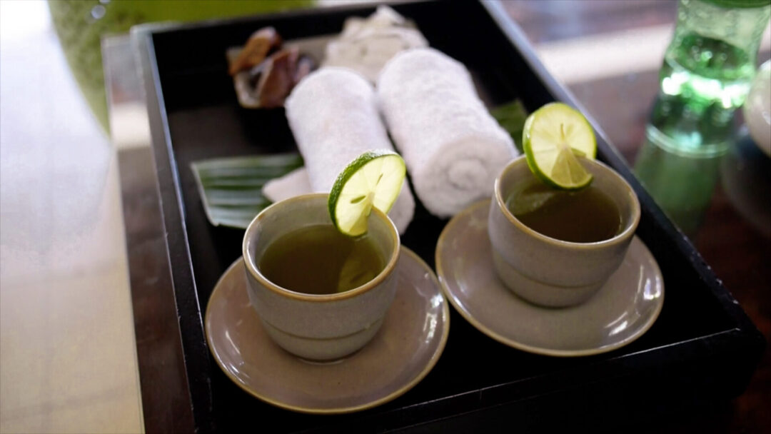 Two welcome drinks and warm towels at a spa in Hoi An, Vietnam