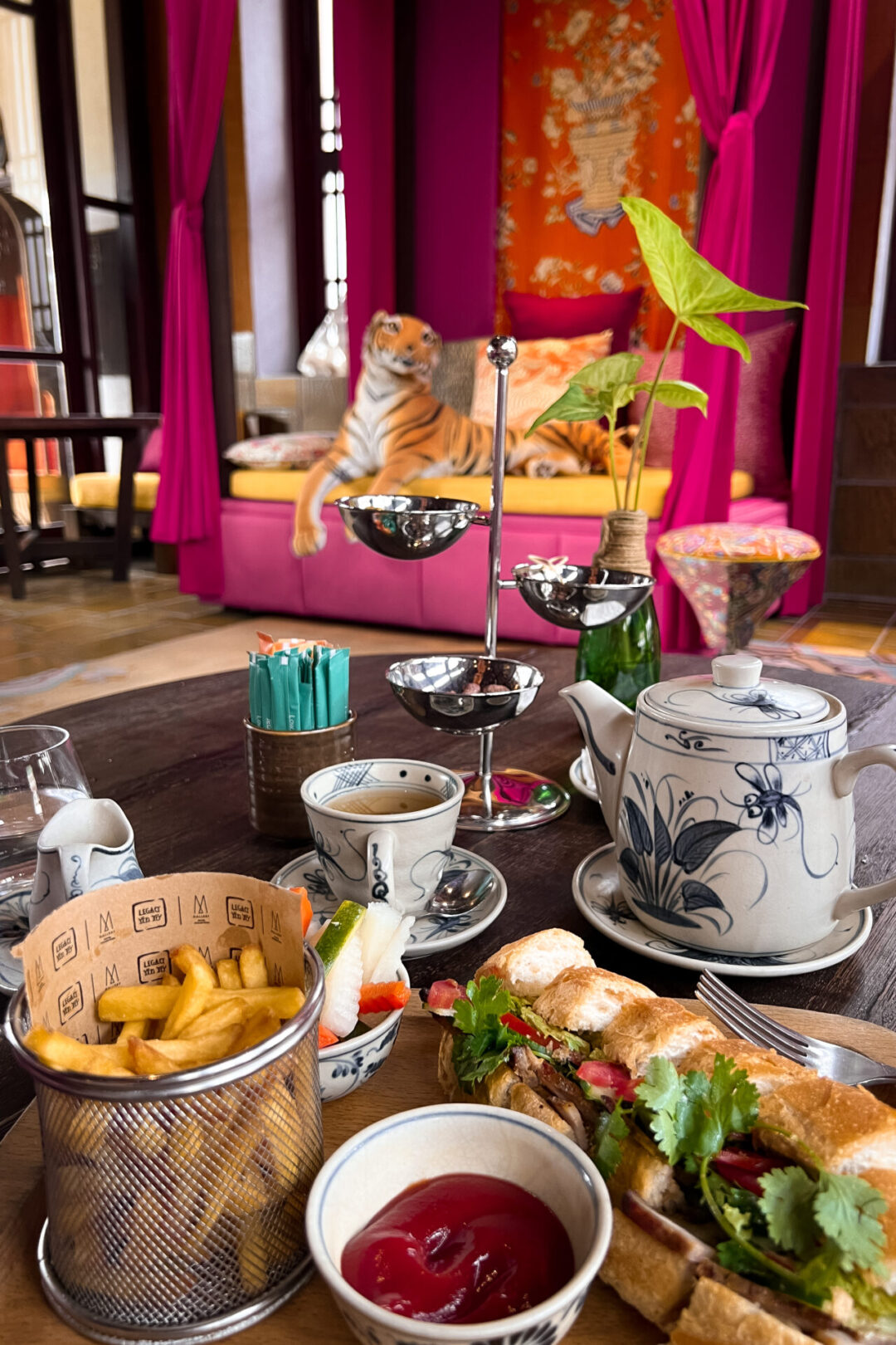 A banh mi sandwich, side of french fires and cup of tea inside Thien Quan restaurant in Legacy Yen Tu Resort in Northern Vietnam