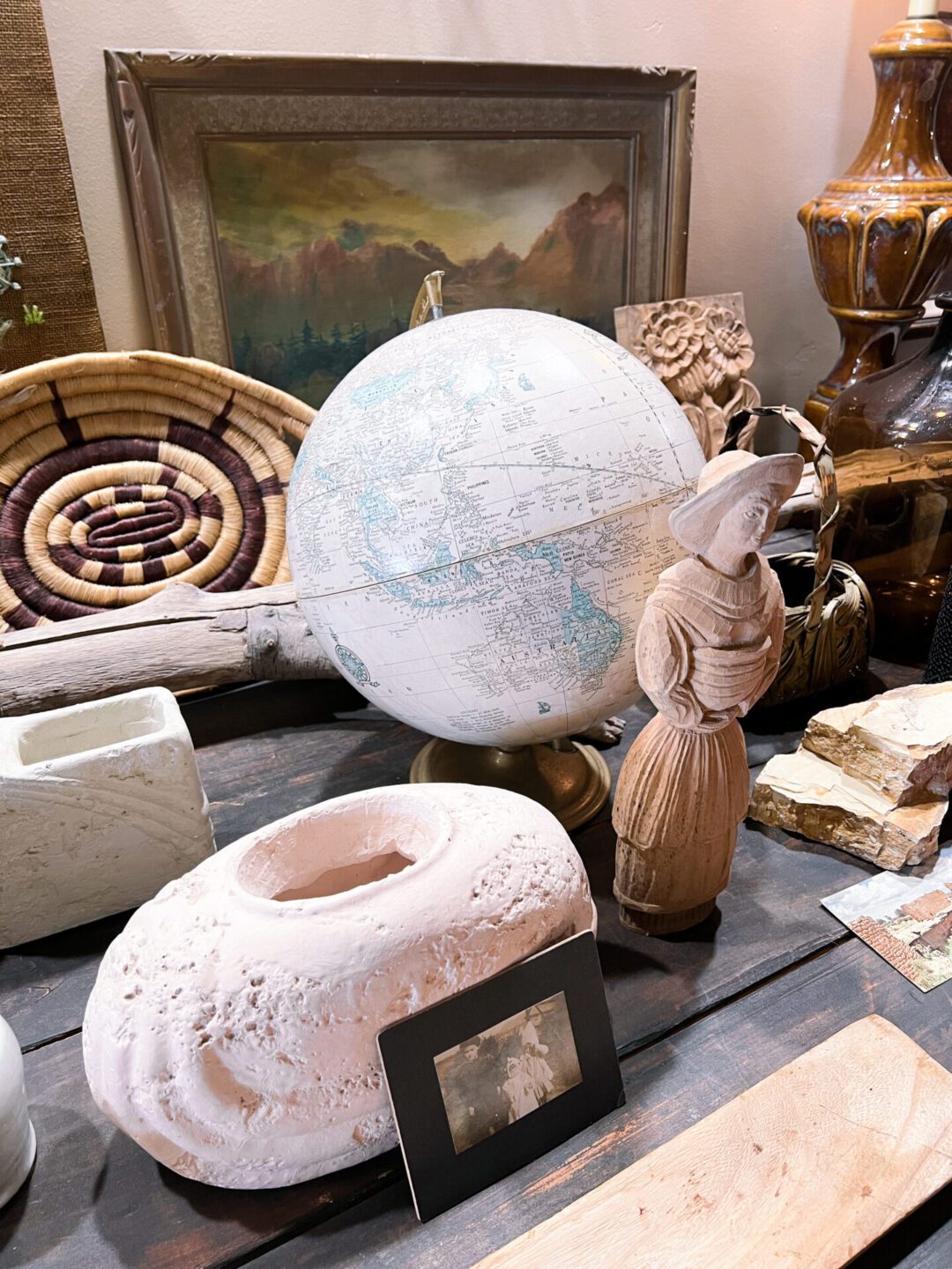 A few figurines and a globe inside The Hangout, a vintage clothing store in Downtown San Luis Obispo, California