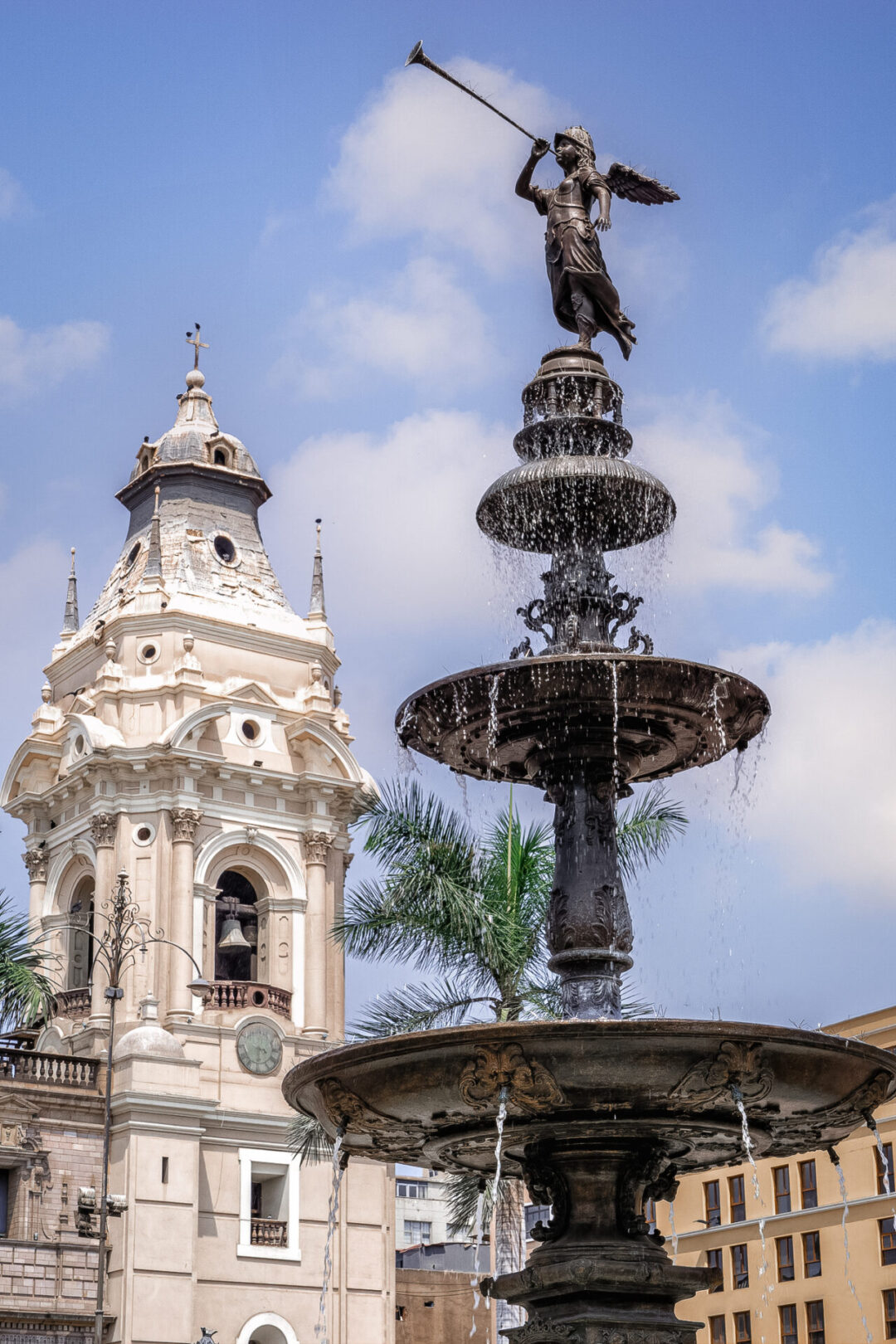 A bronze fountain and Cathedral, Plaza de Armas, Lima