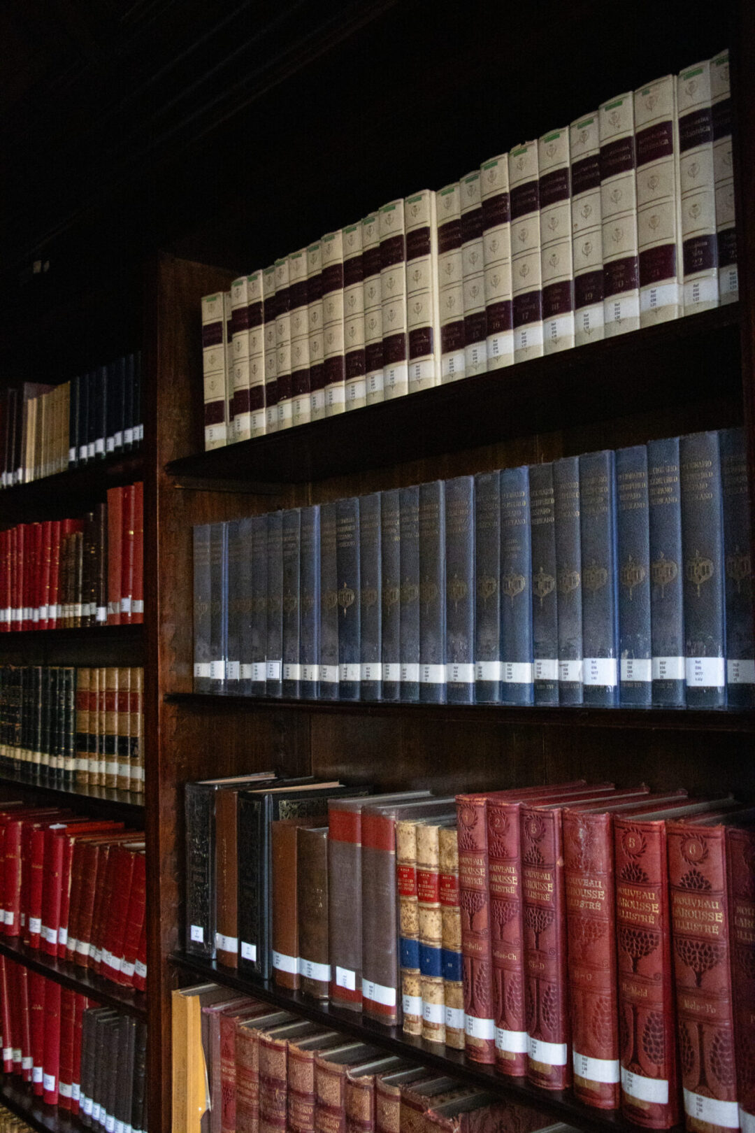 A colorful bookshelf inside the Municipal Palace Library in Lima, Peru