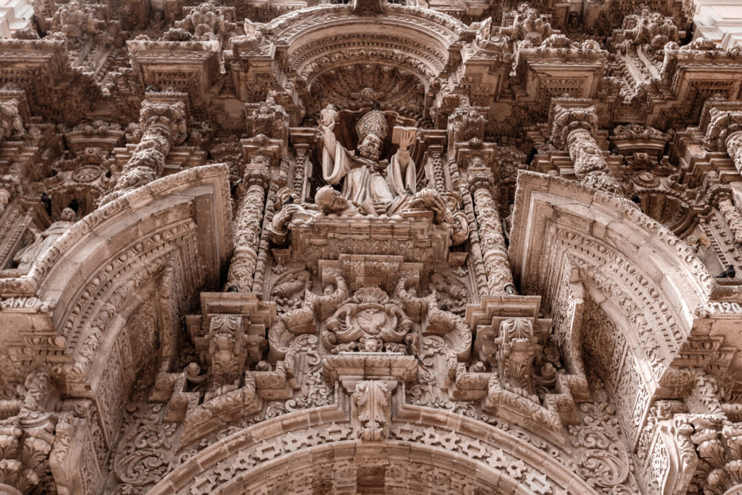 Carved stone on the front facade of the San Agustín Church in Lima, Peru