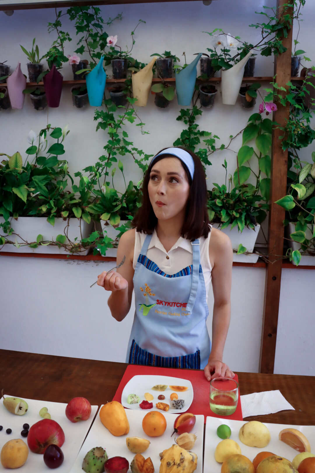 Lima Travel Guide: Travel Blogger Jordan Gassner trying some local fruits at SkyKitchen, a Lima Cooking School
