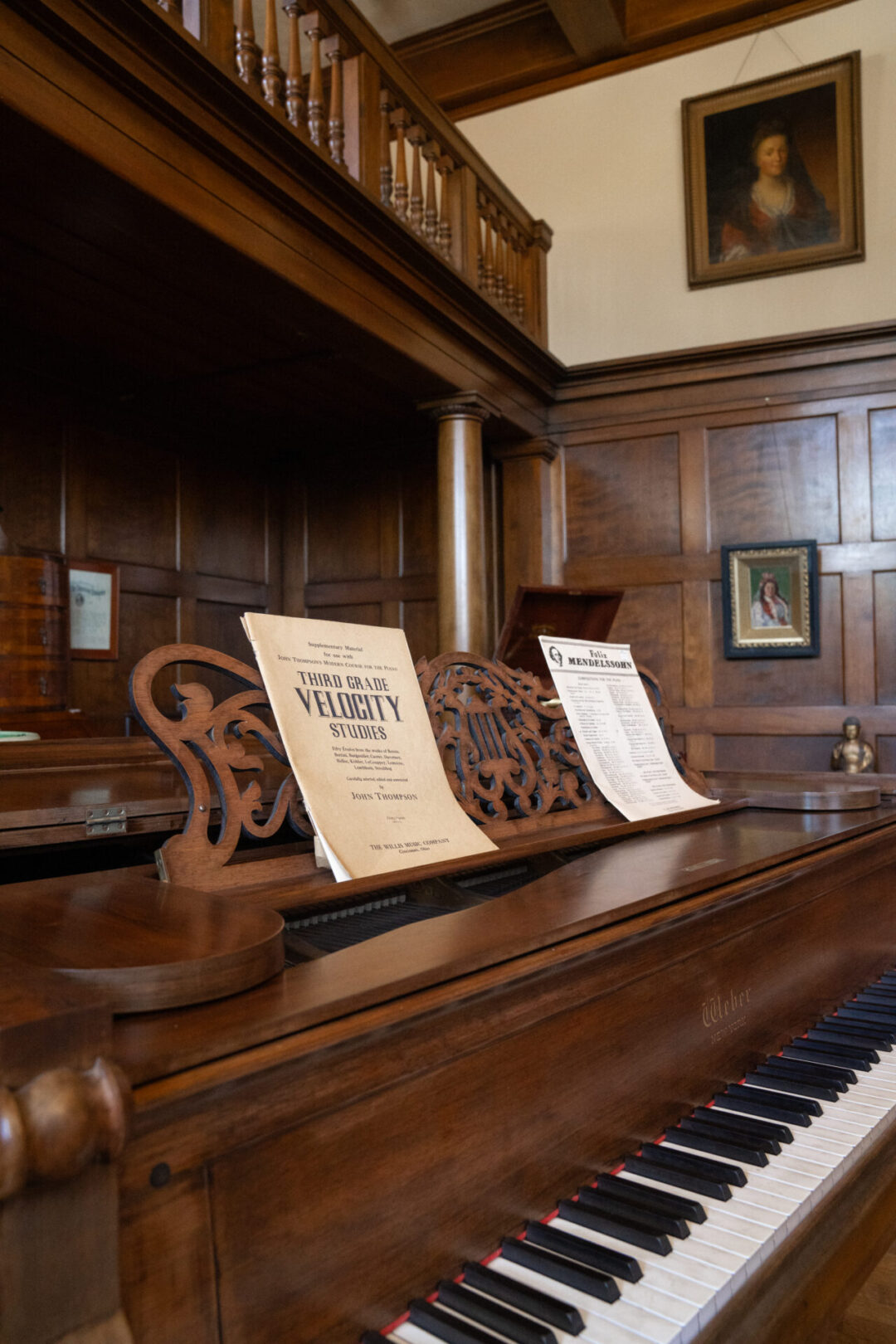 Home Tours in Los Angeles: A piano with a "Third Grade Velocity Studies" book on its lid sitting inside the Fenyes Mansion in Pasadena, California