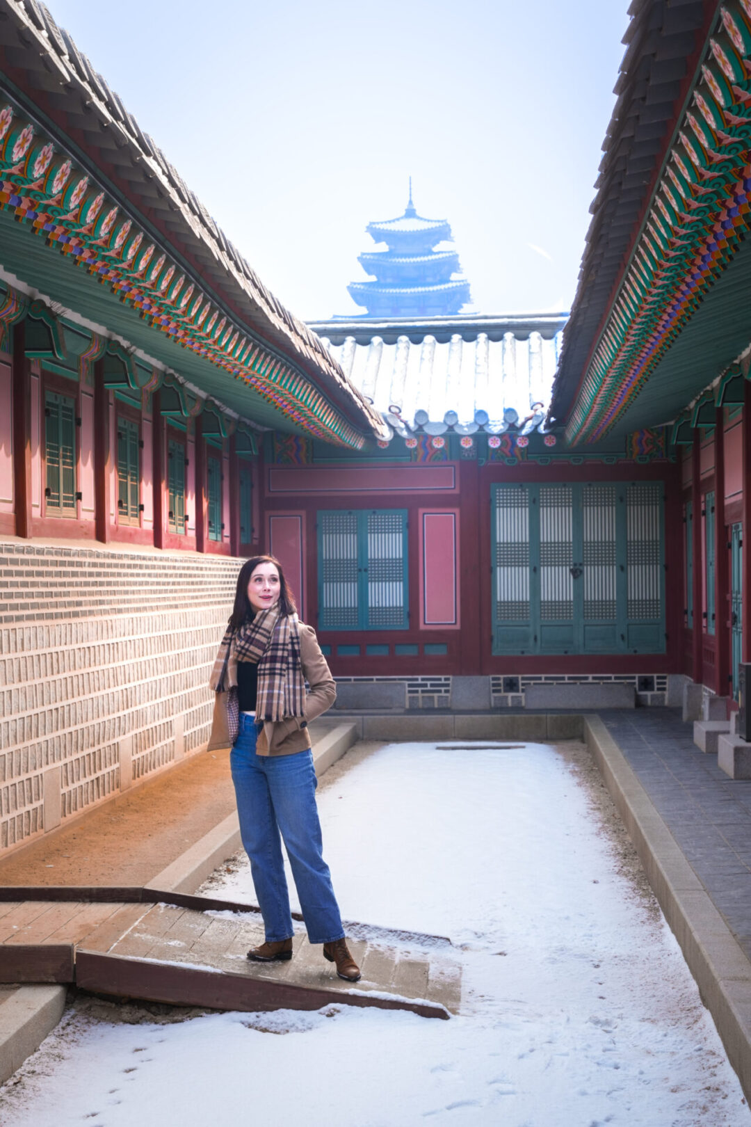 Travel Blogger Jordan Gassner standing on a ramp inside Jagyeongjeon Hall inside Gyeongbokgung Palace