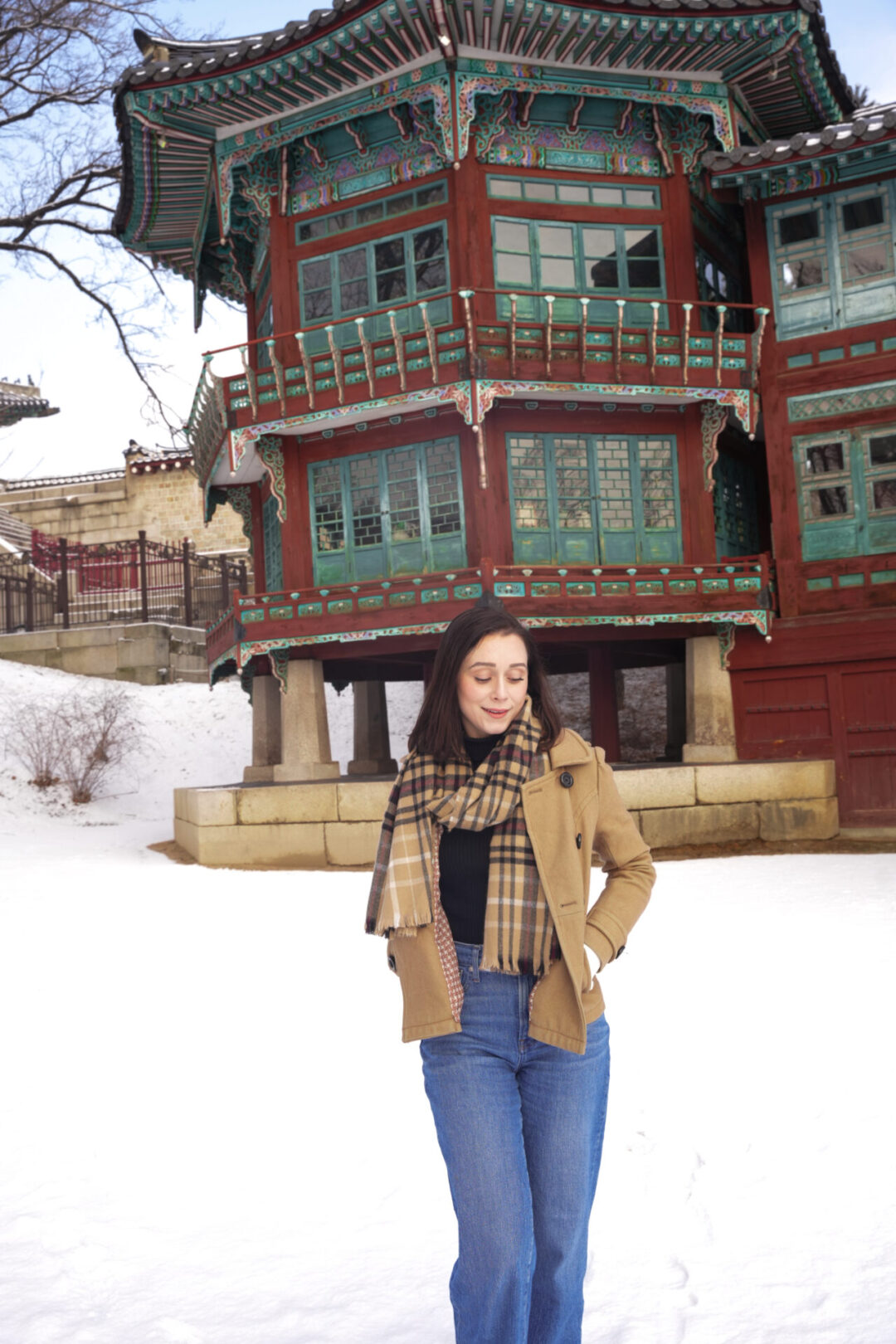 Gyeongbokgung Palace Photos: Travel Blogger Jordan Gassner smiling while walking around Parujeong Pavilion in Seoul, South Korea