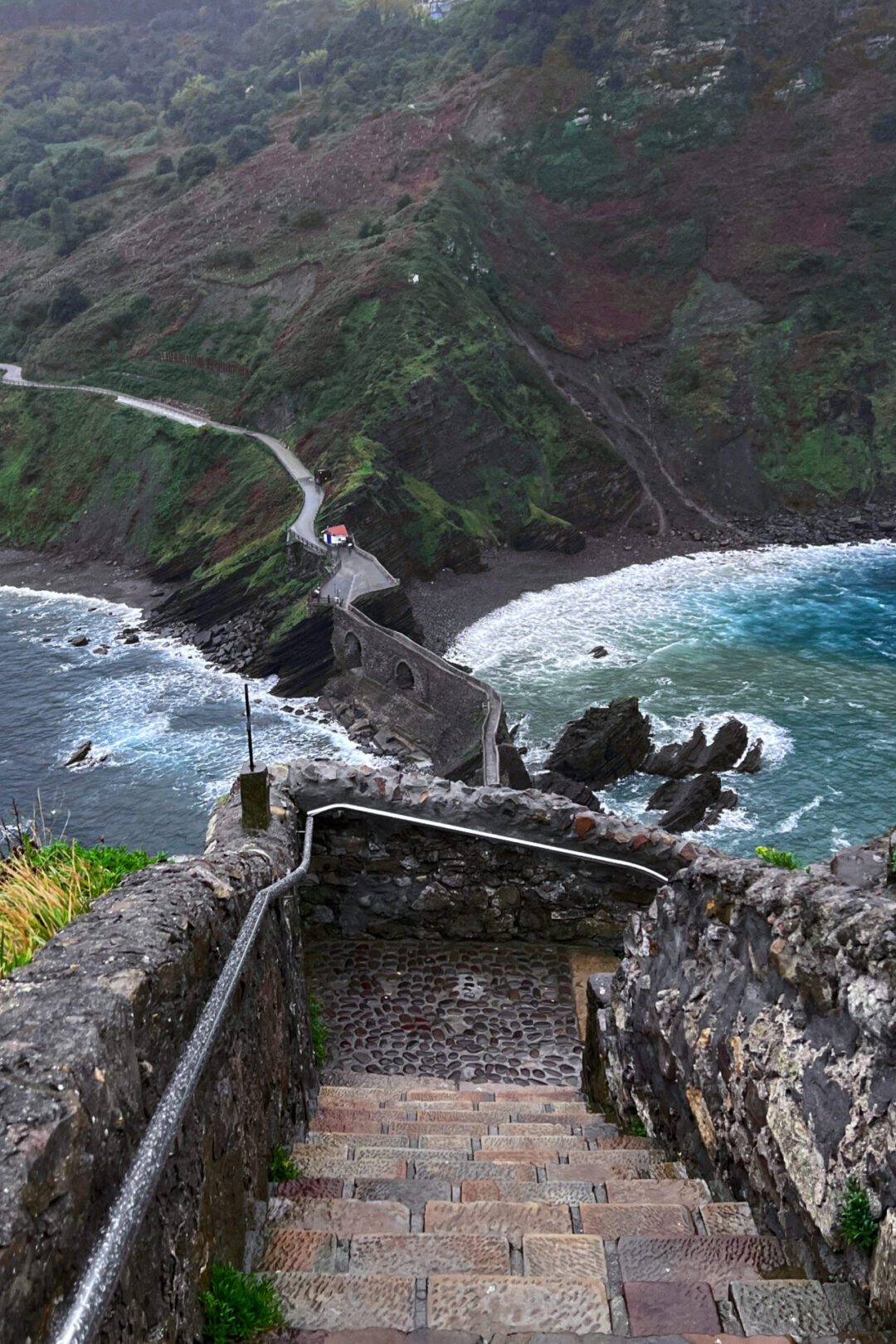 What to do in Bilbao - A top down view of the stairway at San Juan de Gaztelugatxe along the Basque Coast in Spain