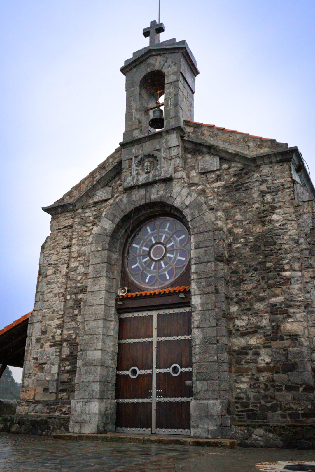 The small stone chapel at the top of the summit of San Juan de Gaztelugatxe in Spain