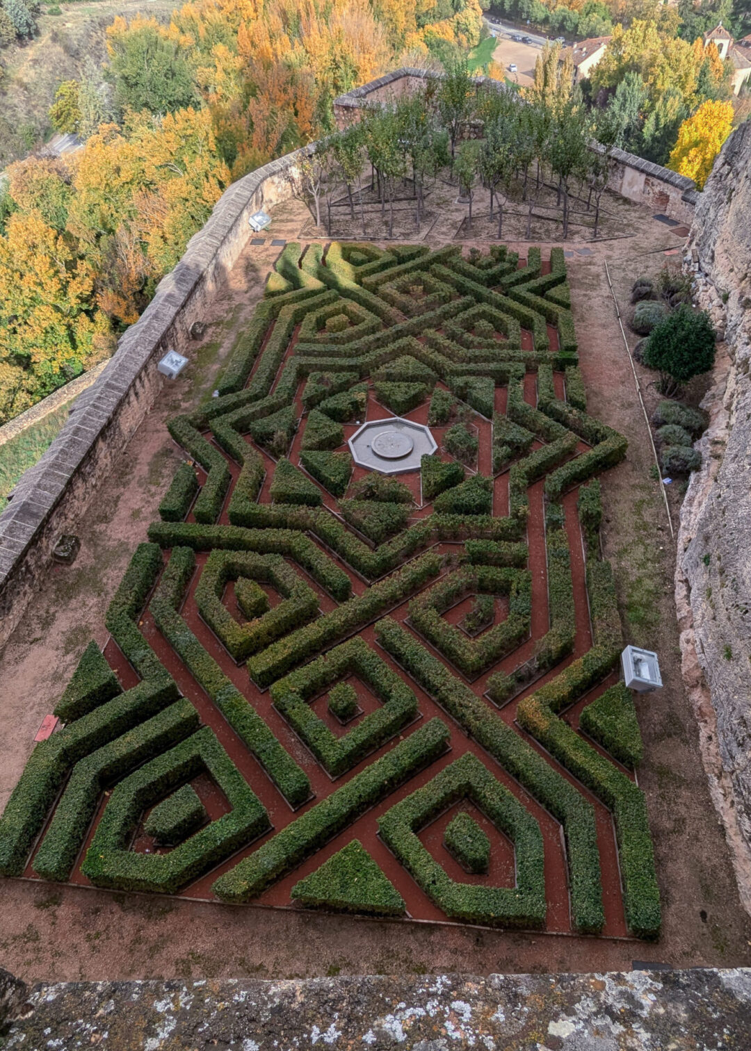 A birds eye view of a garden maze at the Alcazar of Segovia in Spain