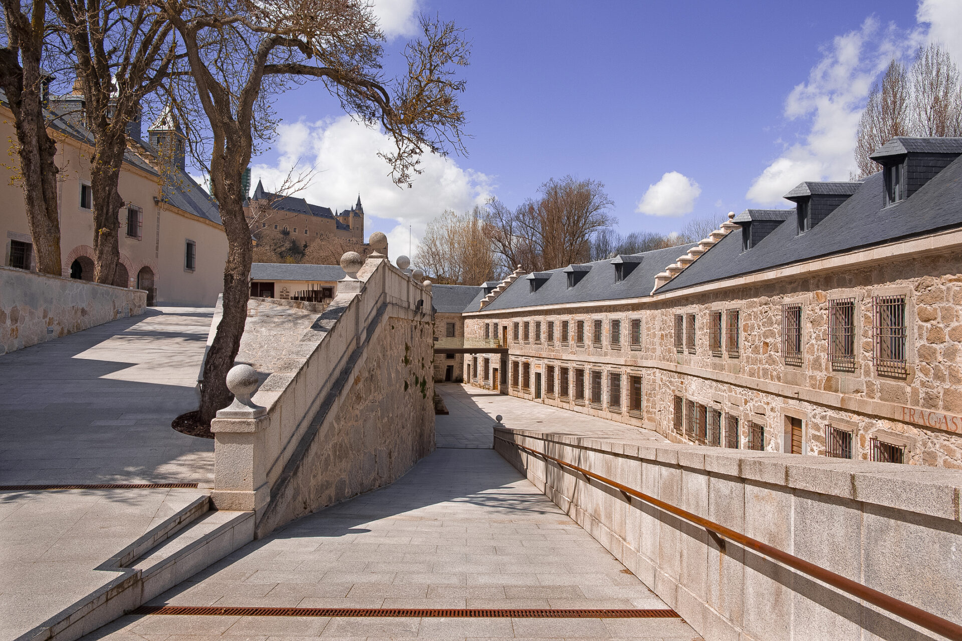 The atrium of Museo Real Casa de Moneda de Segovia with a view of the Alcazar just on the hill behind in Spain