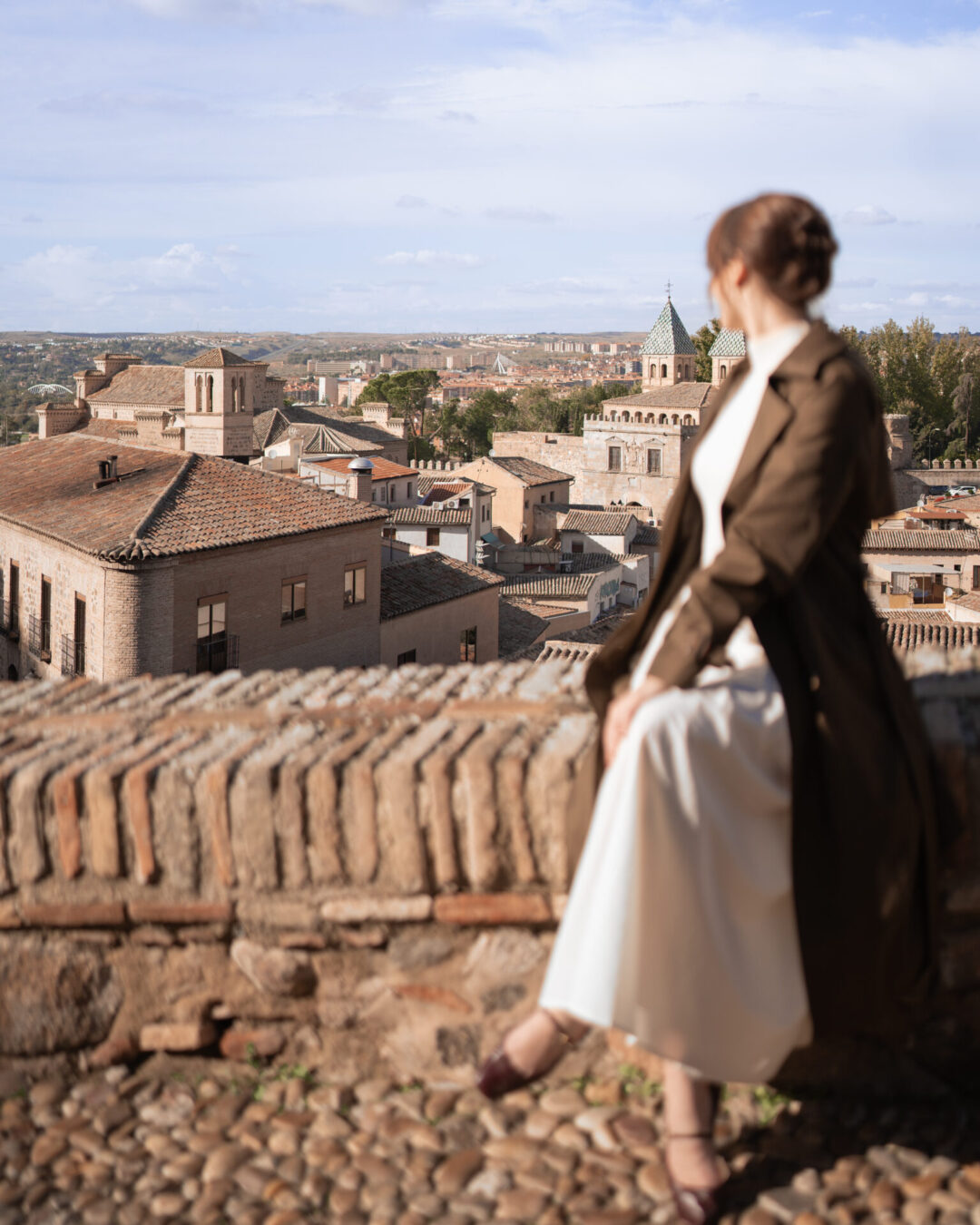 Travel Blogger Jordan Gassner looking out from la Mezquita del Cristo de la Luz in Toledo, Spain