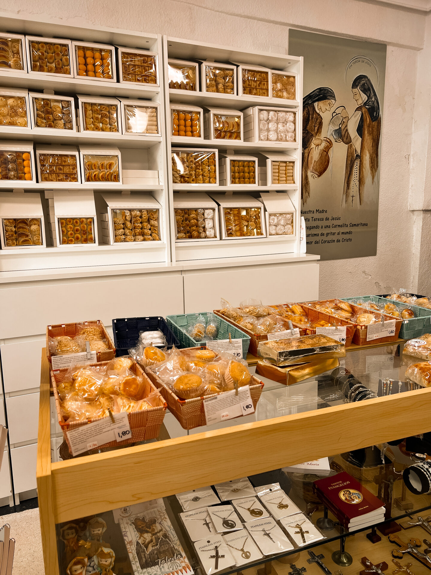 A convent store full of display cases with boxes and individual wrappers of marzipan in Toledo, Spain