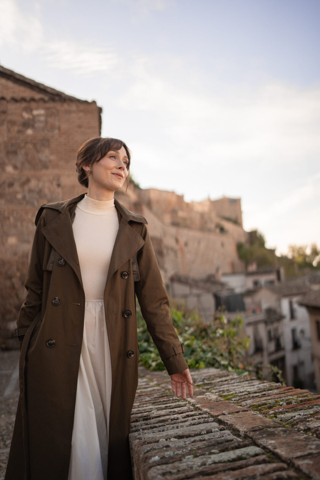Travel Blogger Jordan Gassner smiling from a viewpoint at the top of Toledo, Spain