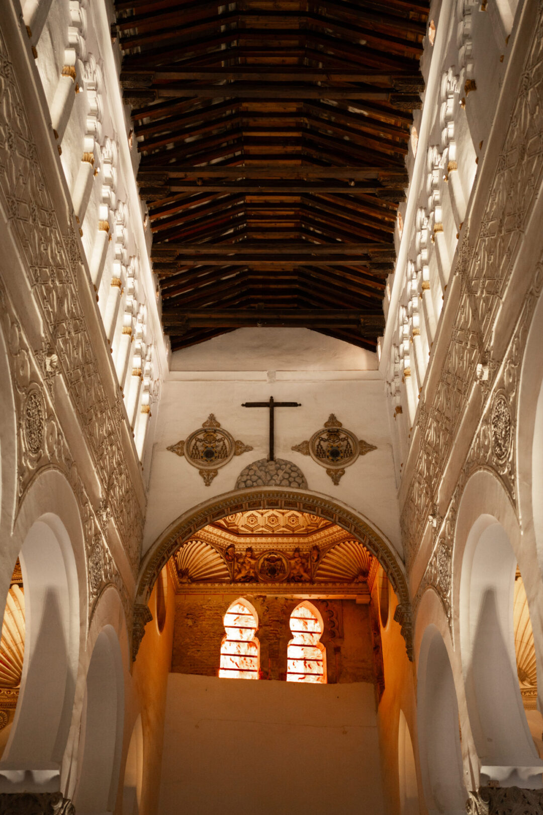 Toledo Spain Travel Guide - The high, wooden-beamed ceiling inside Sinagoga de Santa María La Blanca, a 13th century synagogue in Toledo, Spain