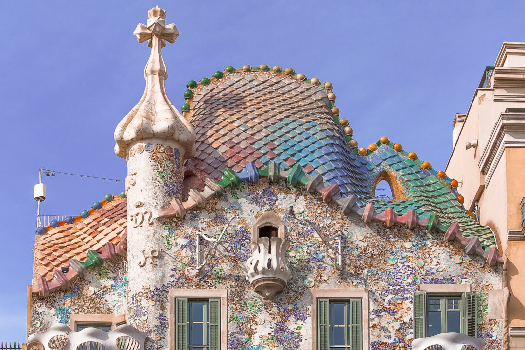 The rainbow scaled roof of Casa Batllo in Barcelona, Spain