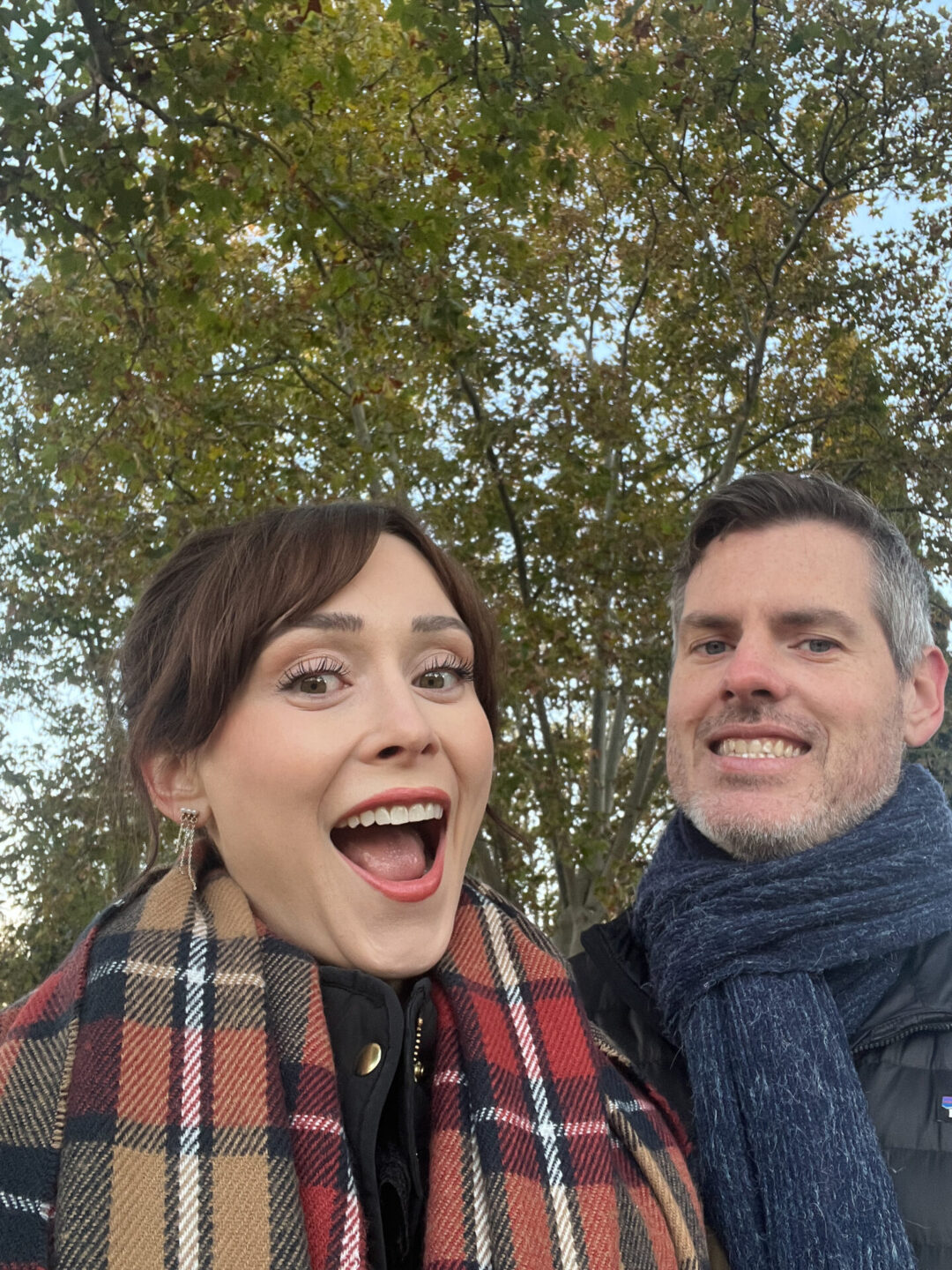 Traveling with a Partner after Solo Travel - Travel Blogger Jordan Gassner and her partner smiling in Madrid, Spain