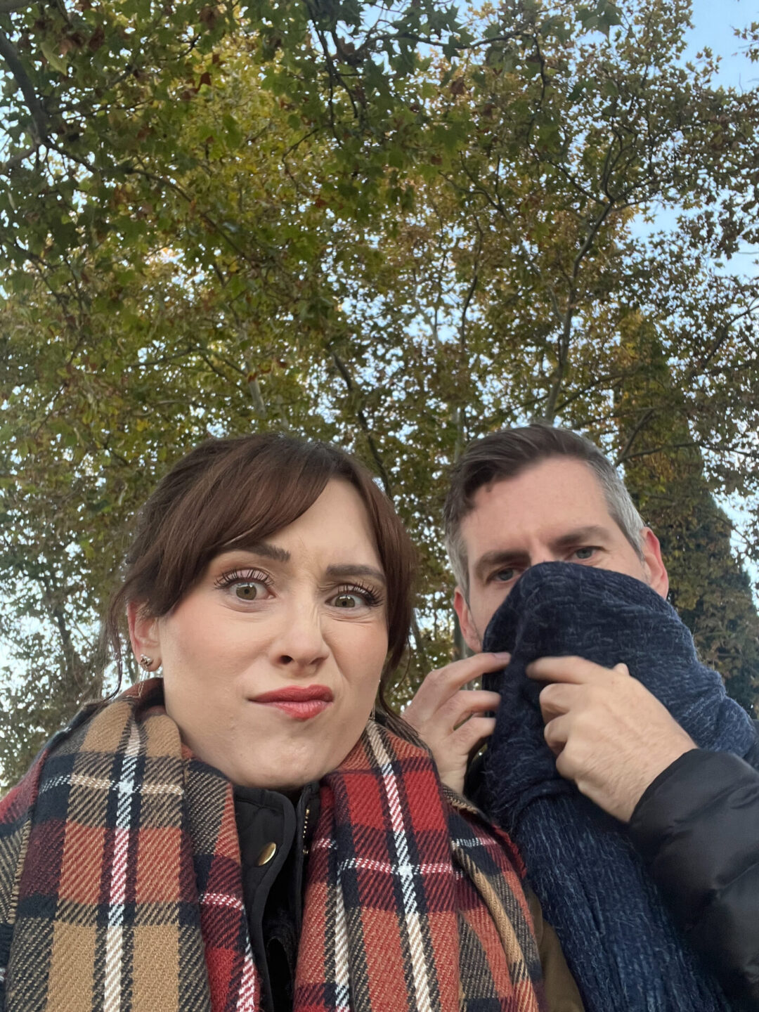 Travel Blogger Jordan Gassner and her partner making faces because of the cold in Madrid, Spain