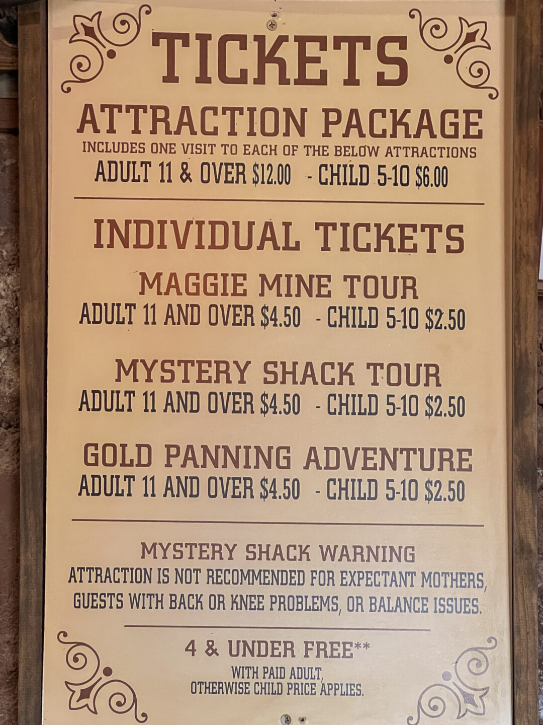 The sign indicating attraction prices inside Calico Ghost Town in California