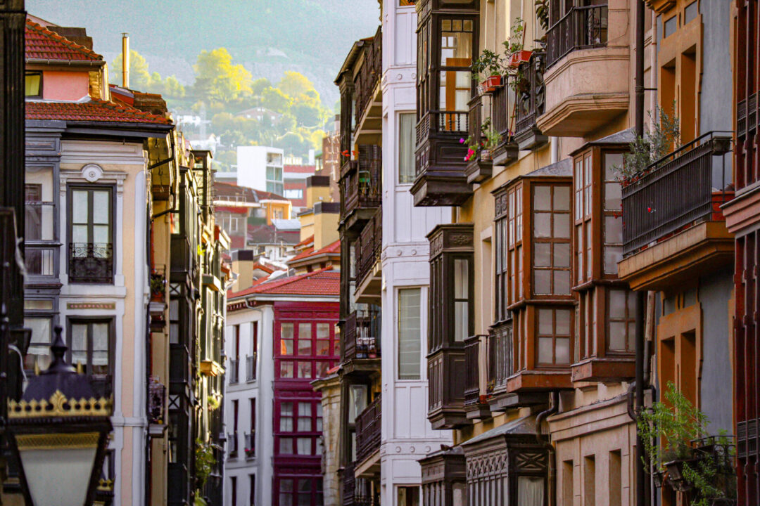 A picturesque street full of vintage apartments and balconies in Casco Viejo in Bilbao, Spain