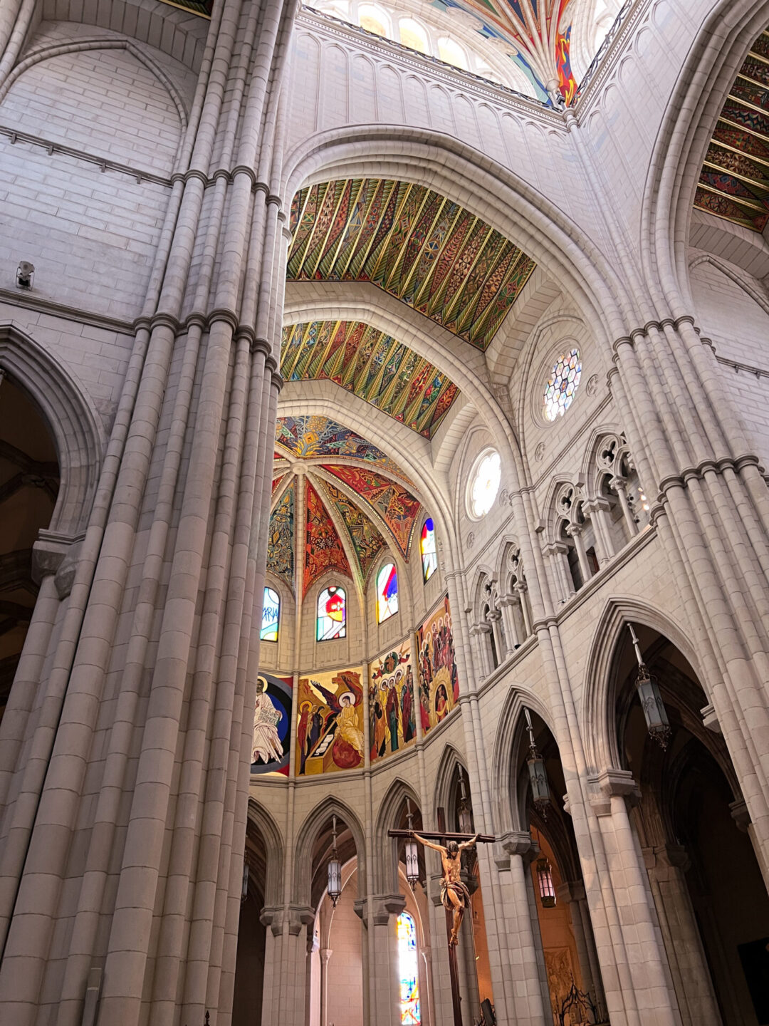 A column showing off the high ceilings and beautiful color atop the Almudena Cathedral in Madrid, Spain