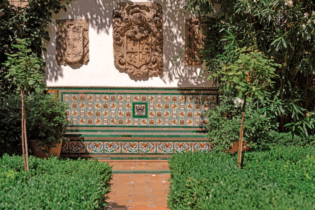 A patterned tile bench inside the Andalusian garden at the Sorolla Museum in Madrid