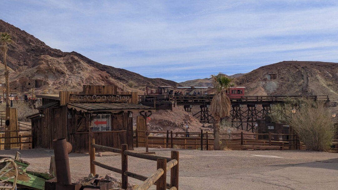 The Calico Odessa Railroad making its way along the short wooden tracks at the old west Calico Ghost Town in California