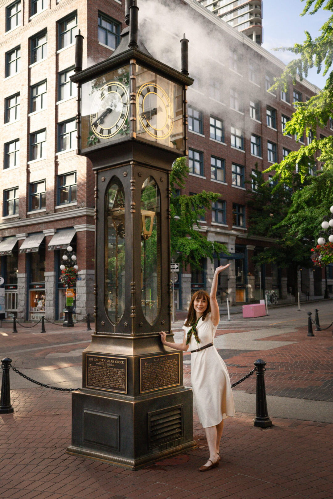 Travel Blogger Jordan Gassner smiling near the Gastown Steam Clock in Vancouver, Canada
