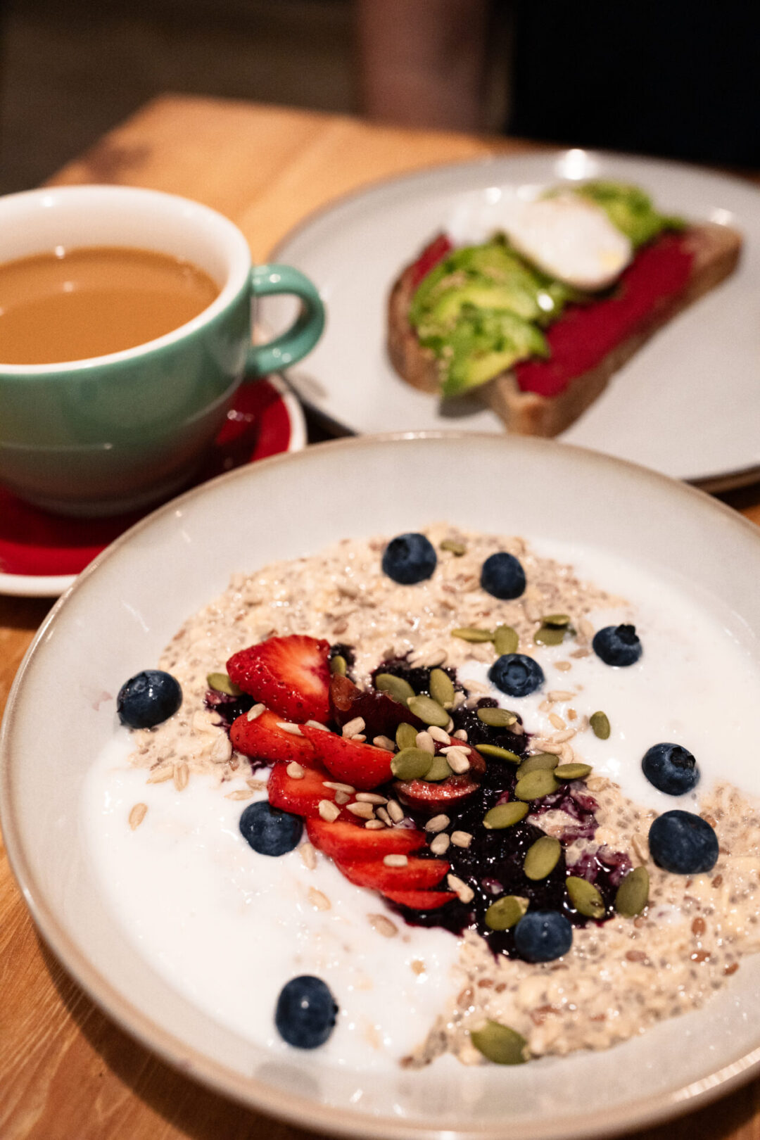 An avocado toast and overnight oats bowl from Koffie Cafe in Downtown Vancouver, Canada
