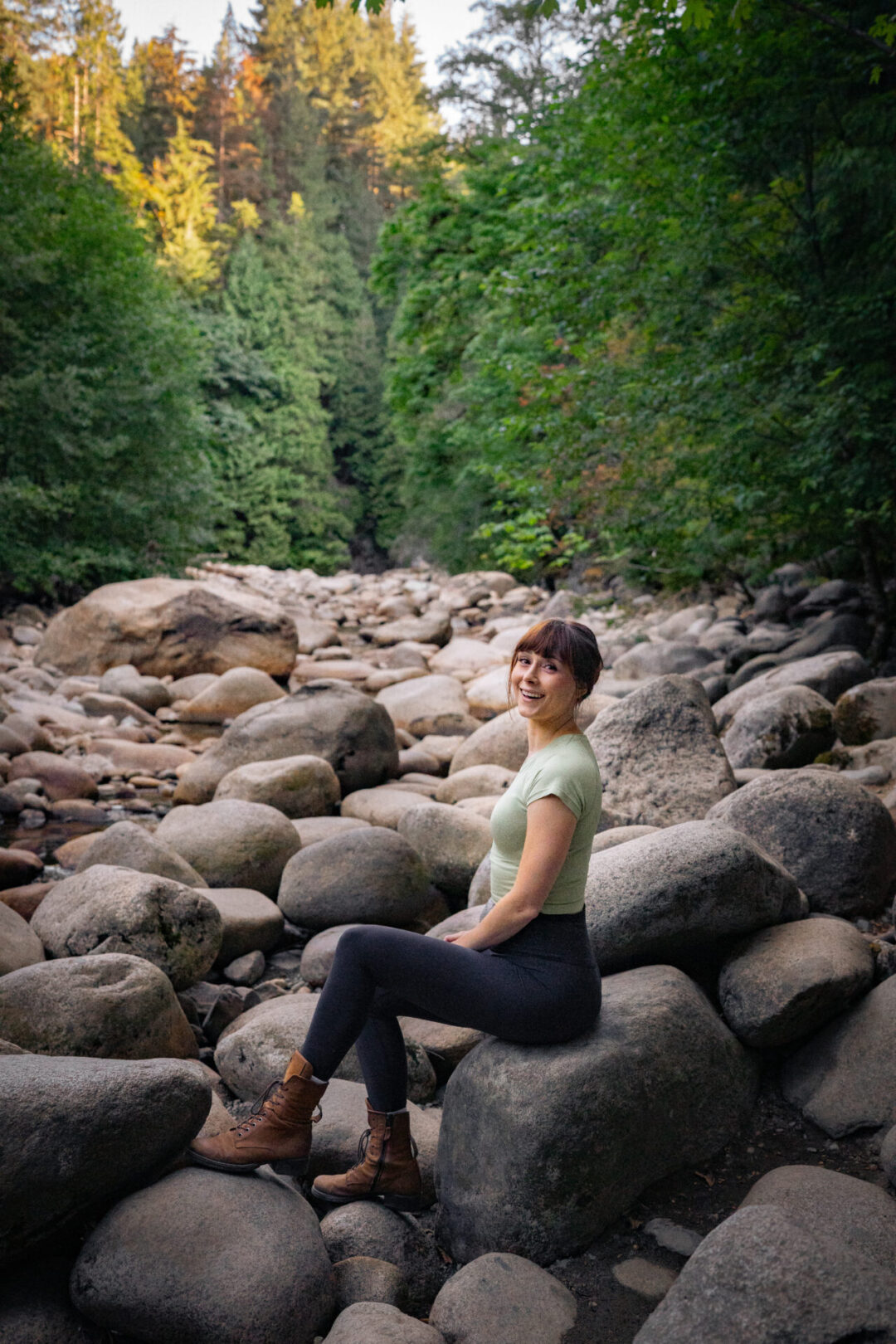 Vancouver Neighborhoods: Travel Blogger Jordan Gassner smiling in Lynn Canyon in North Vancouver