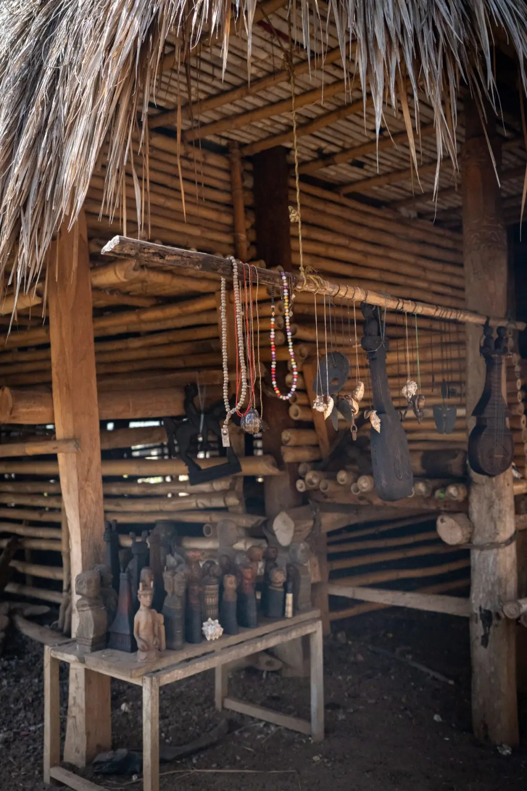 A group of sculptures, jewelry, and instruments in the village of Ratenggaro in Sumba, Indonesia