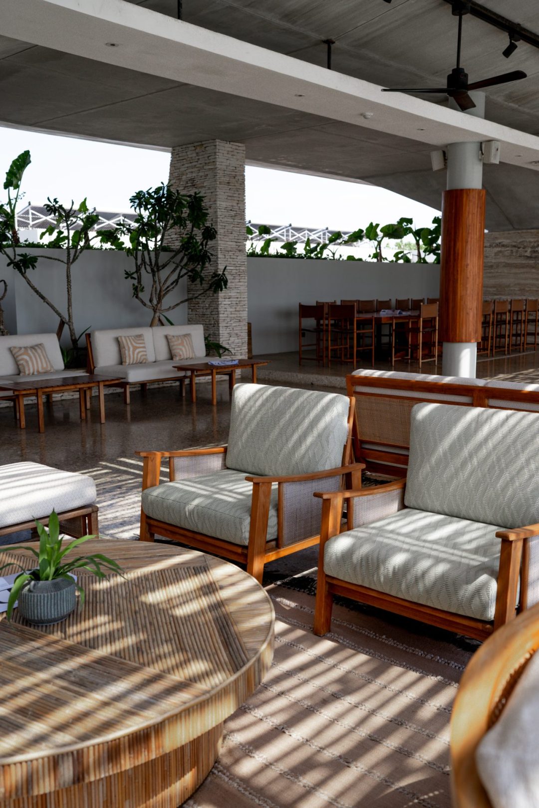 An empty lobby with plenty of plush seating and tables inside Cap Karoso resort in Sumba, Indonesia