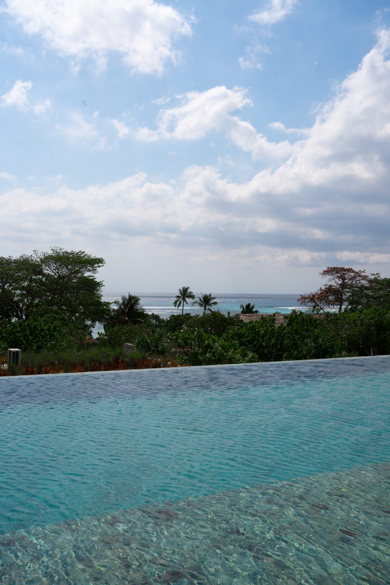 A view of the ocean from the main infinity pool at Cap Karoso resort in Sumba, Indonesia