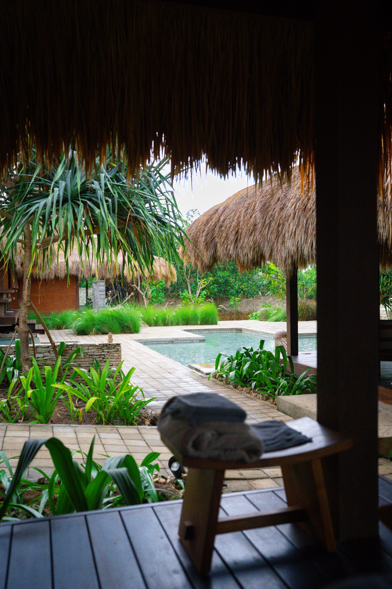 The exterior of Malala Spa as seen from underneath one of the traditional inspired structures at Cap Karoso Resort in Sumba, Indonesia