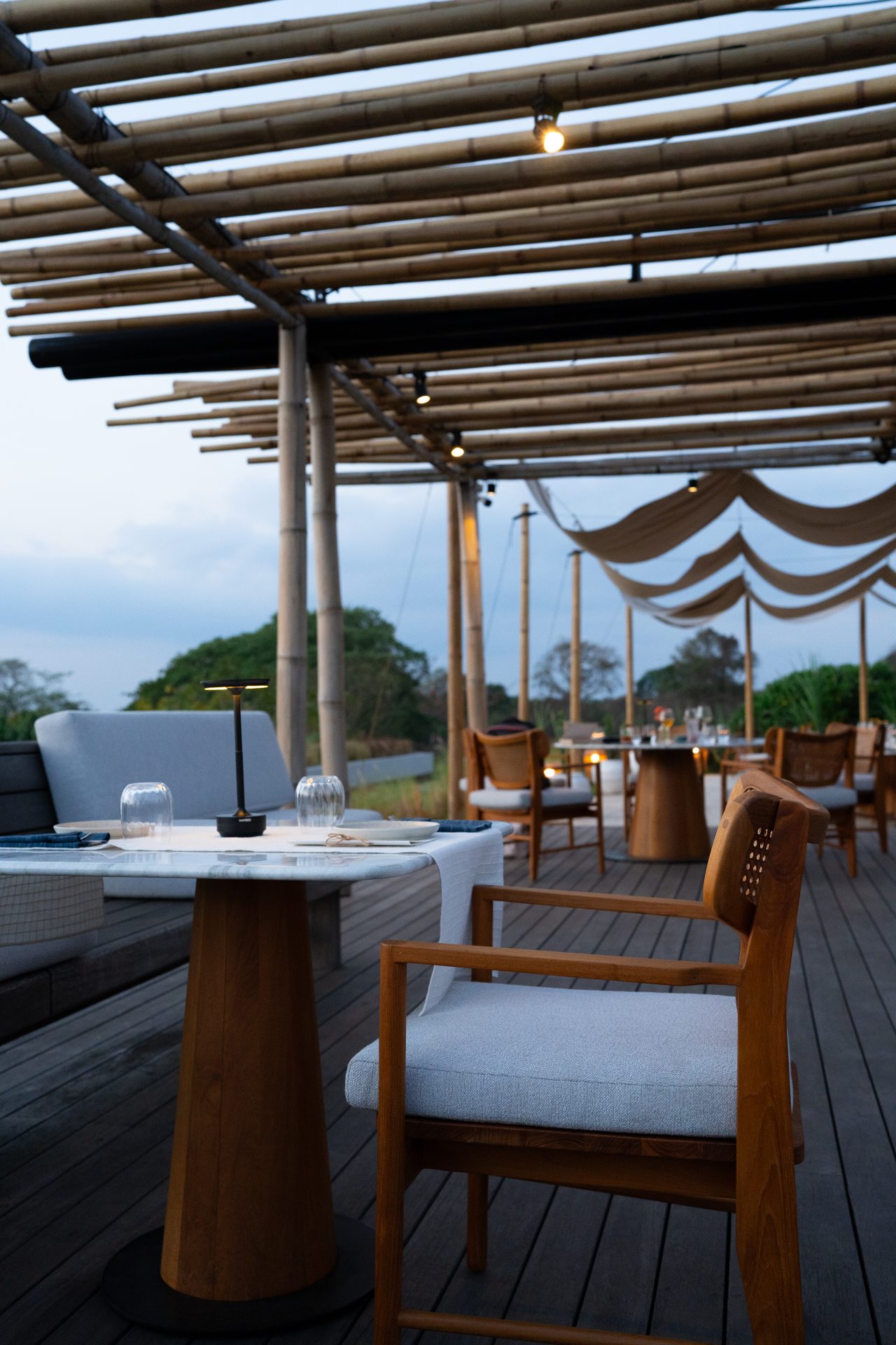 Apicine Restaurant at Cap Karoso resort in Sumba, Indonesia at sunset