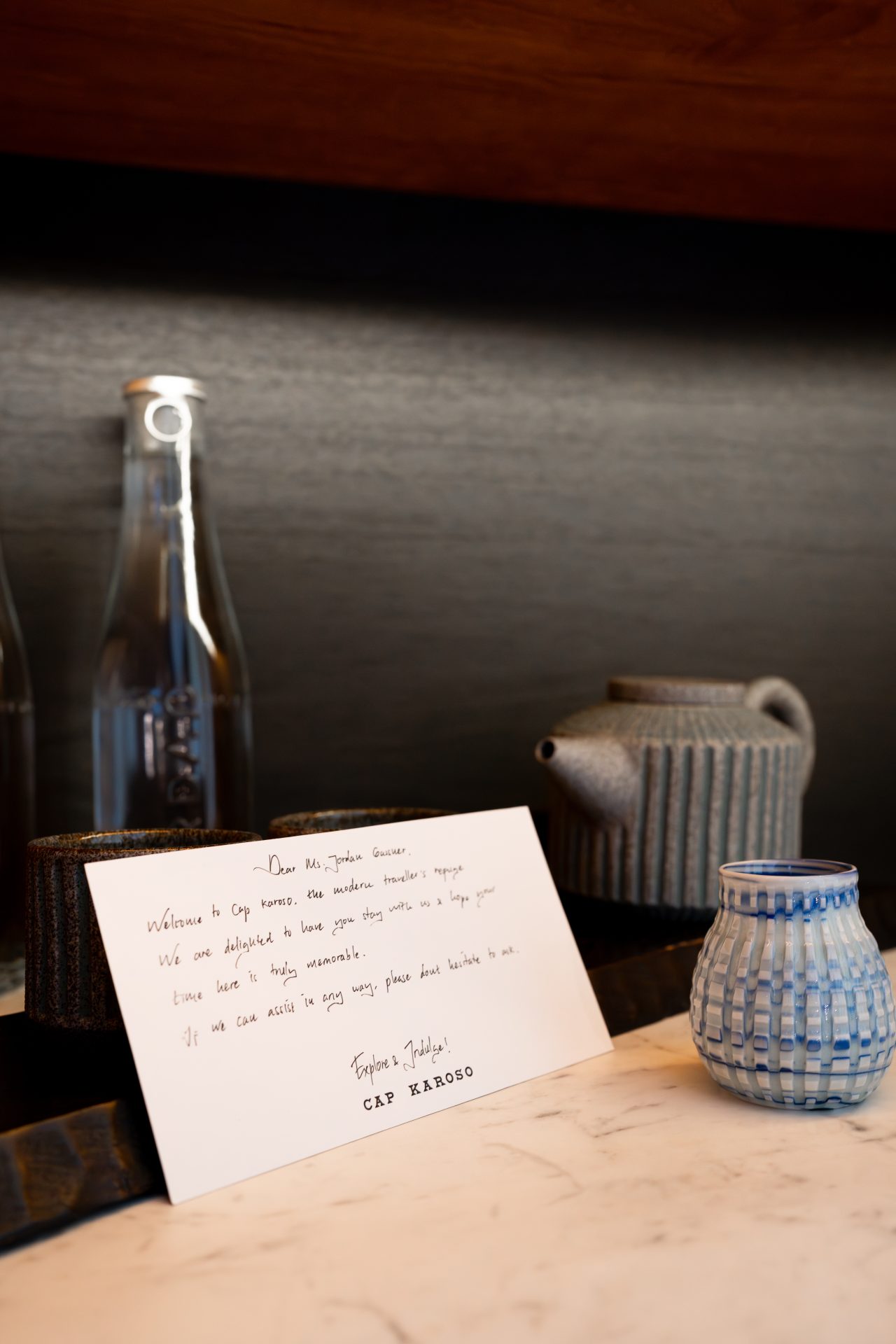 Travel Blogger Jordan Gassner's handwritten "Welcome" card inside a guest room at Cap Karoso resort in Sumba, Indonesia