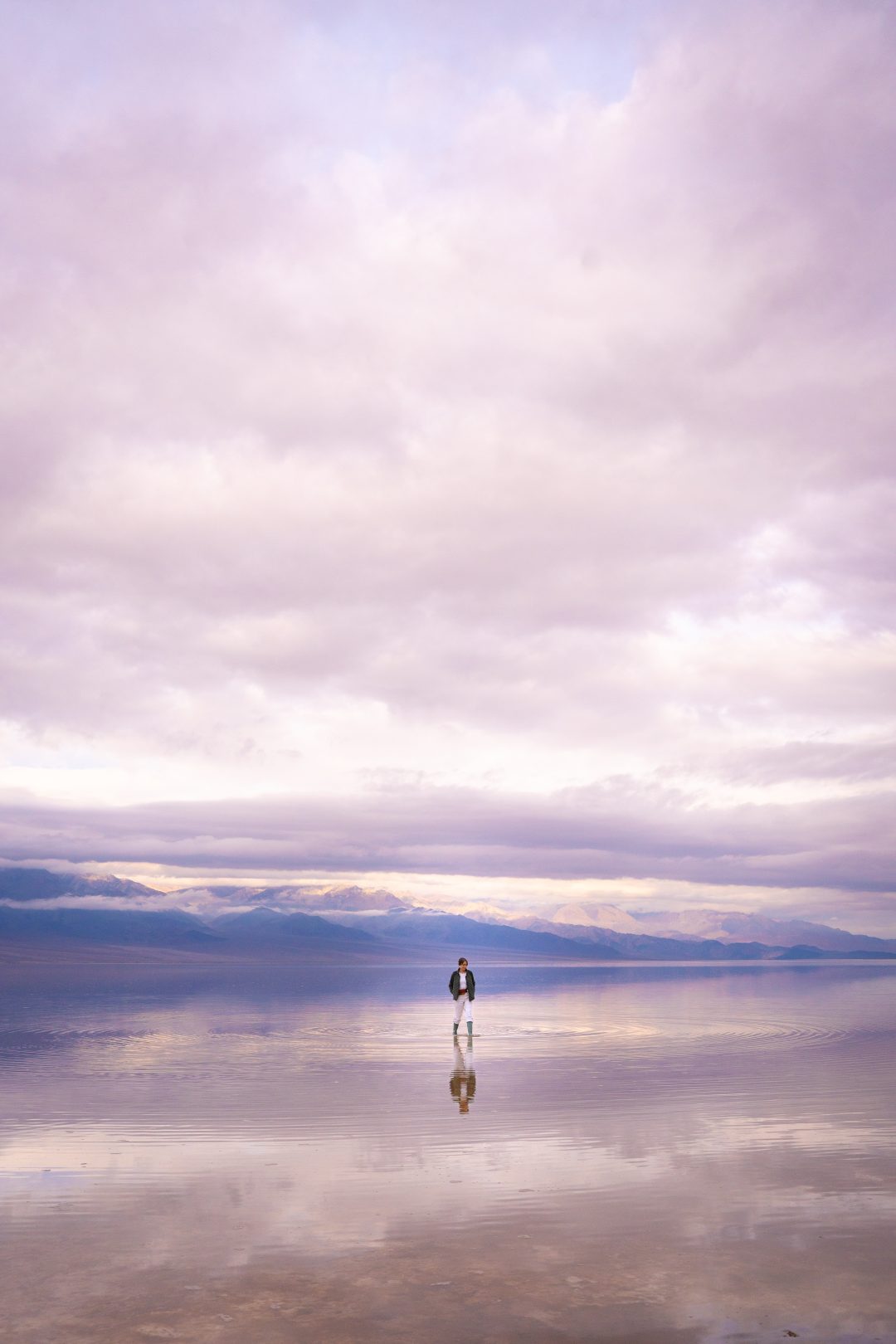 Travel Blogger Jordan Gassner walking along Lake Manly in Death Valley National Park in California