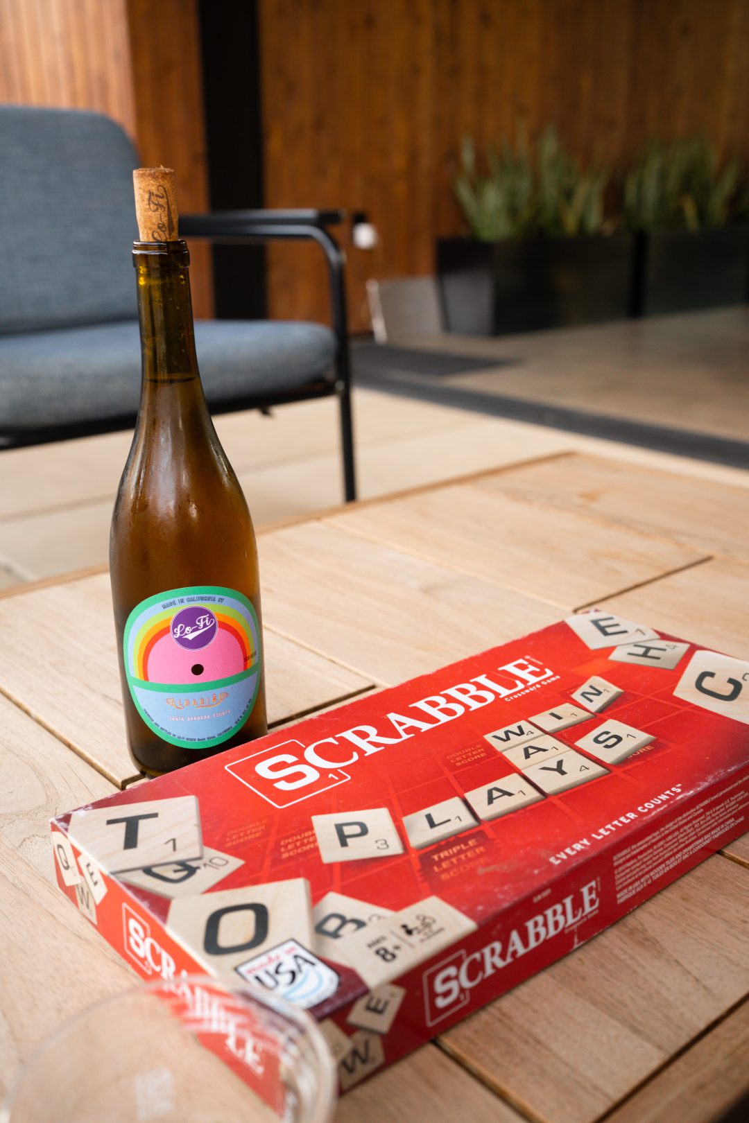 A box of scabble and a bottle of orange wine from AutoCamp Sequoia In Three Rivers, California