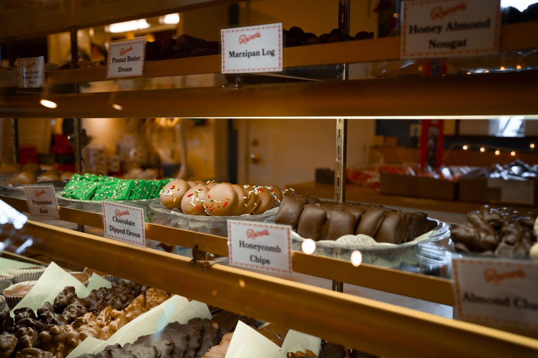 A group of candies inside a glass display case in Reimer's Candies and Gifts in Three Rivers, California
