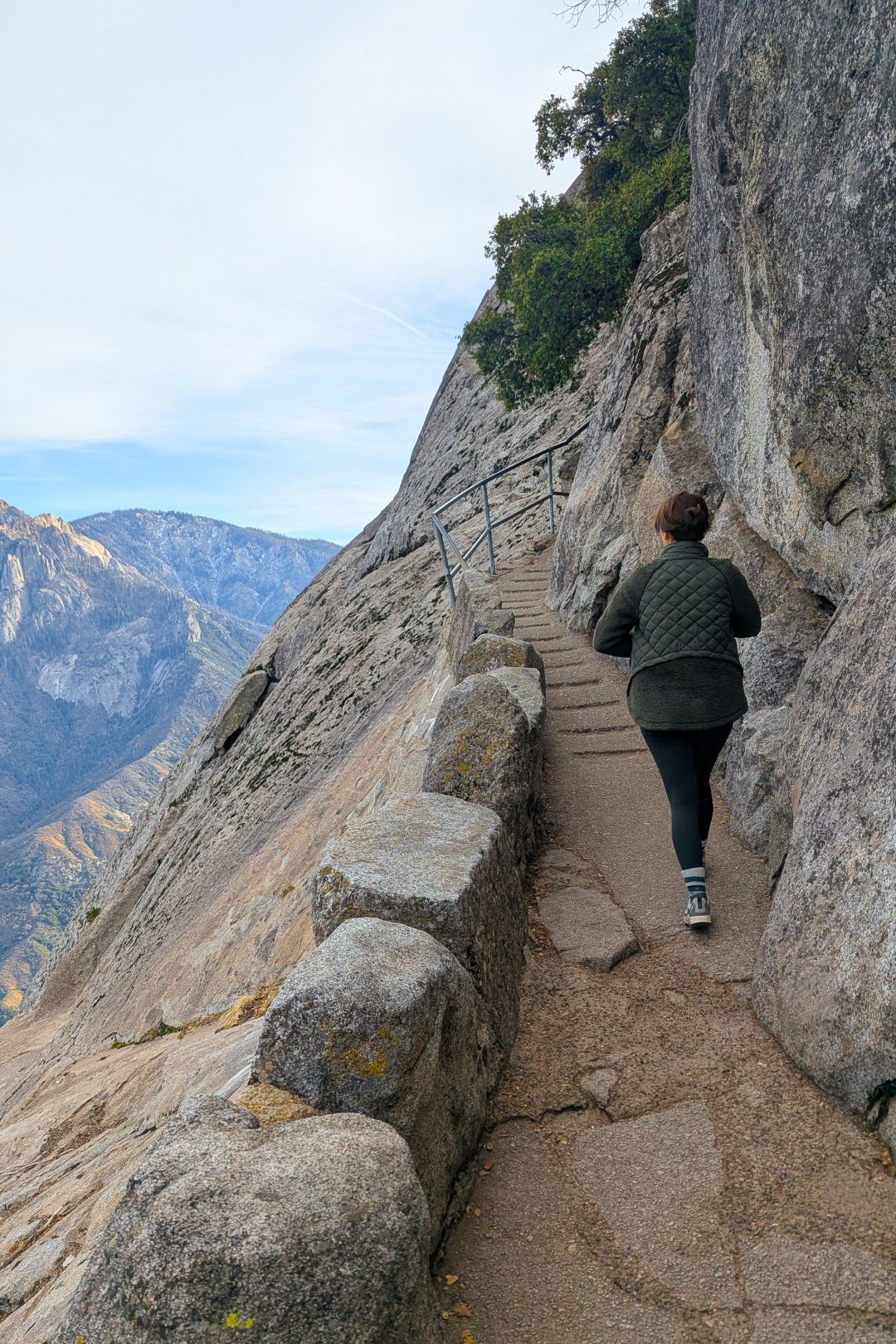 Travel Blogger Jordan Gassner hiking to the top of Moro Rock in Sequoia National Park