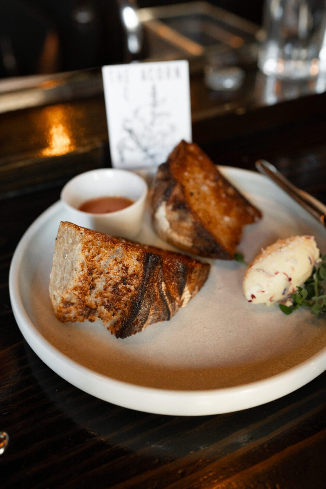 An order of sourdough bread from The Acorn, a vegetable-forward restaurant in Vancouver, Canada