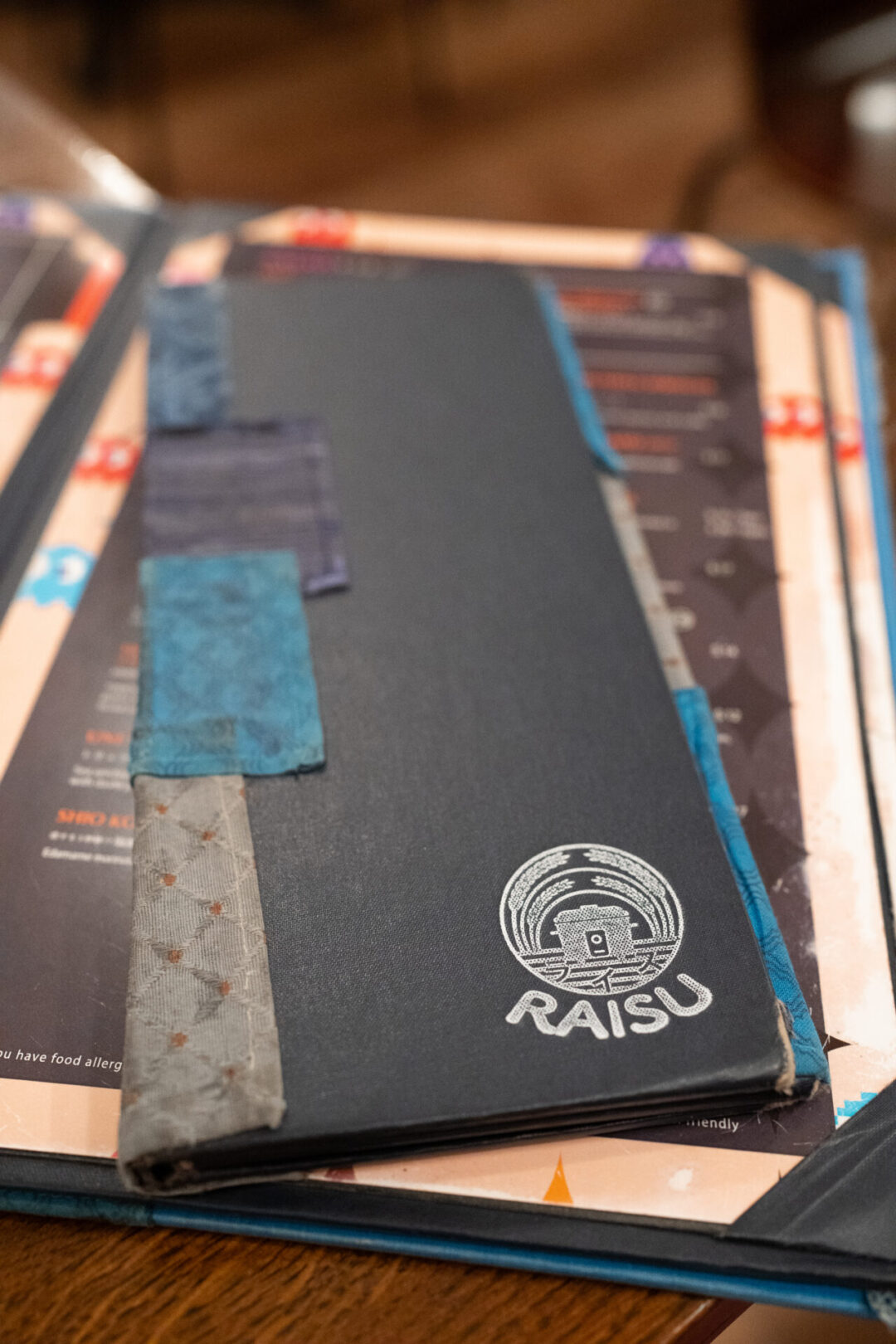 Best places to eat in Vancouver for first-timers: The menu from Raisu, a Japanese comfort food restaurant in Vancouver, Canada