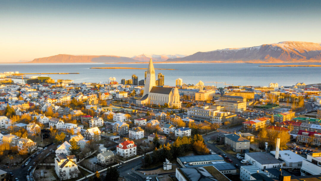 10 Best Solo Travel Countries For First-Timers: An aerial view of Reykjavik, Iceland during the summer