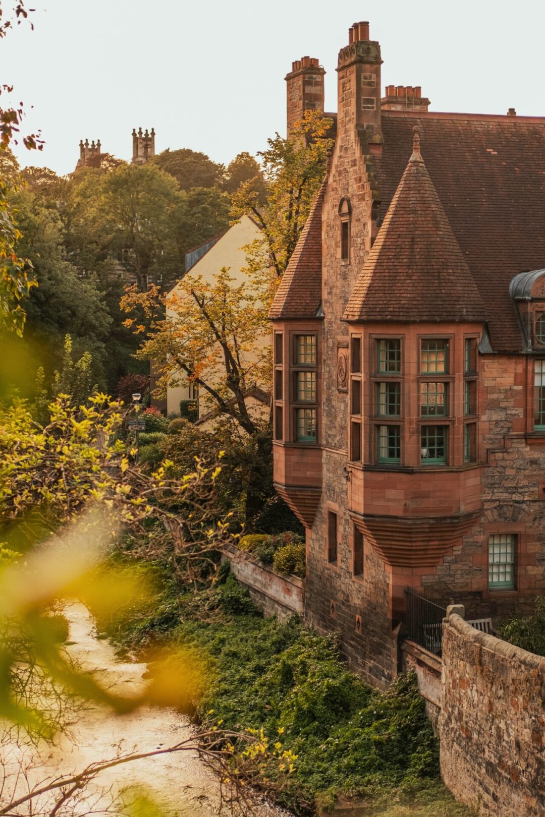 A row of historic homes in Scotland at sunset