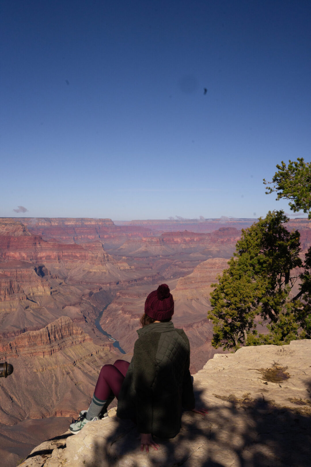 Travel Blogger Jordan Gassner looking out over Mohave Viewpoint at the Grand Canyon