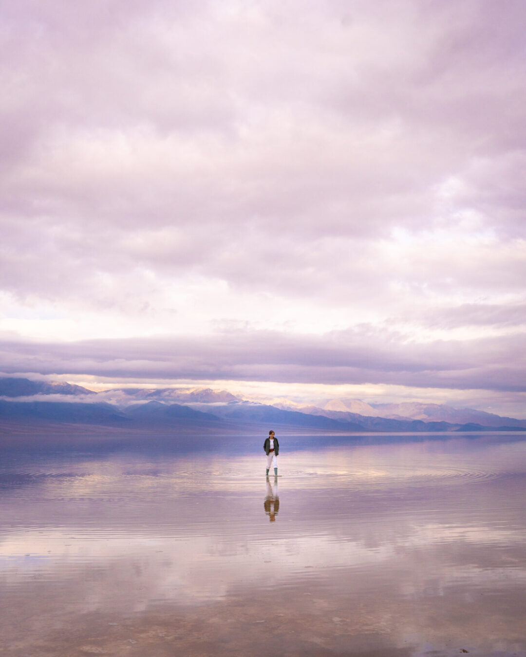 Travel Blogger Jordan Gassner walking along Lake Manly in Death Valley National Park in California