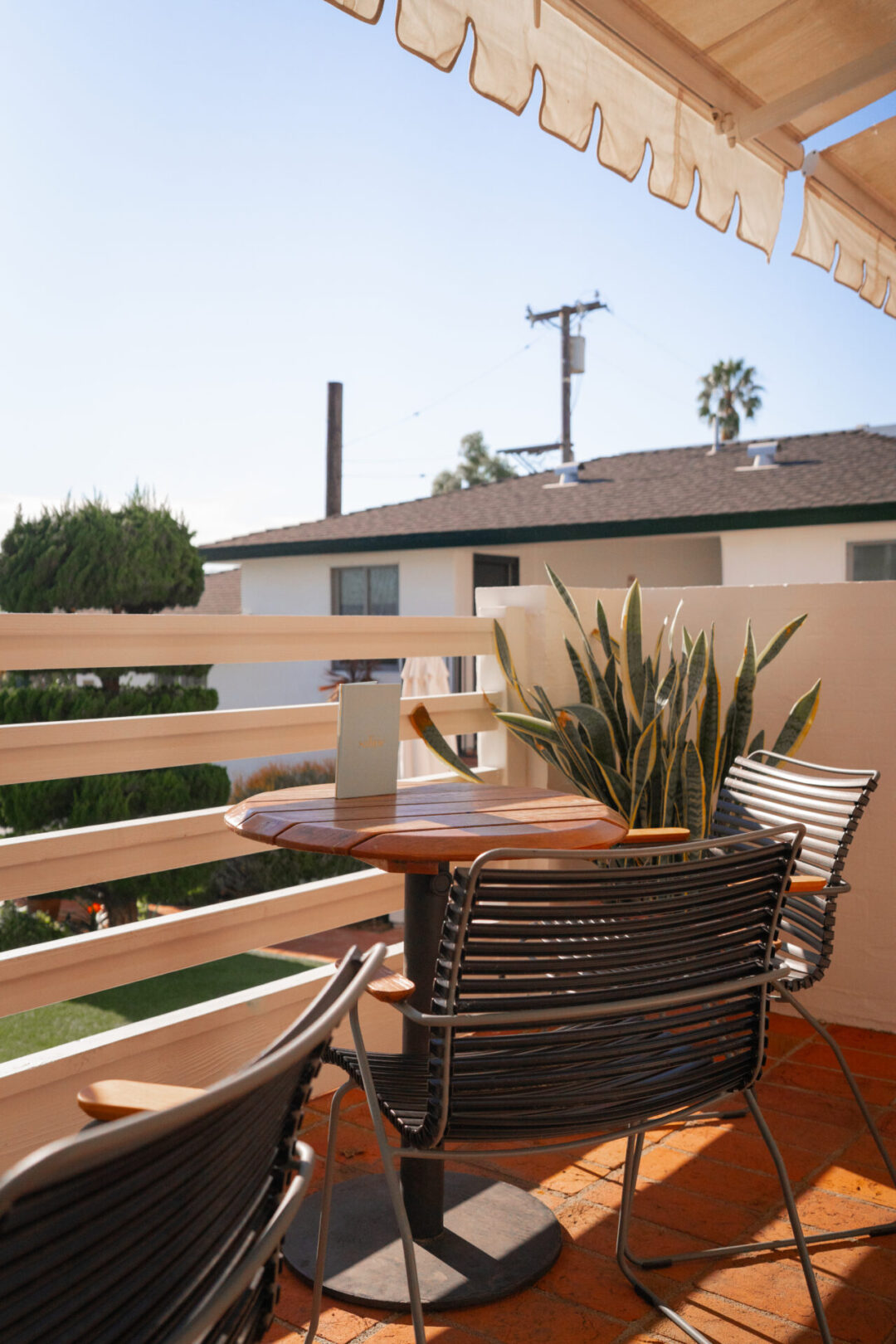 Laguna Beach Weekend Trip: ta table on a balcony overlooking the ocean at Hotel Joaquin