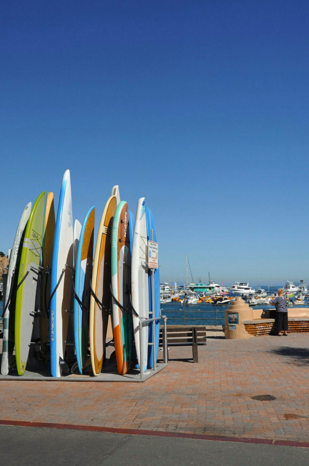 A stack of surfboards near the waterfront on Catalina Island, one of the Best Weekend Trips from Los Angeles